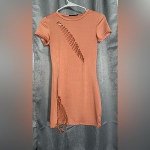 Tan colored Mini dress with slips in the breast area & thigh area💋